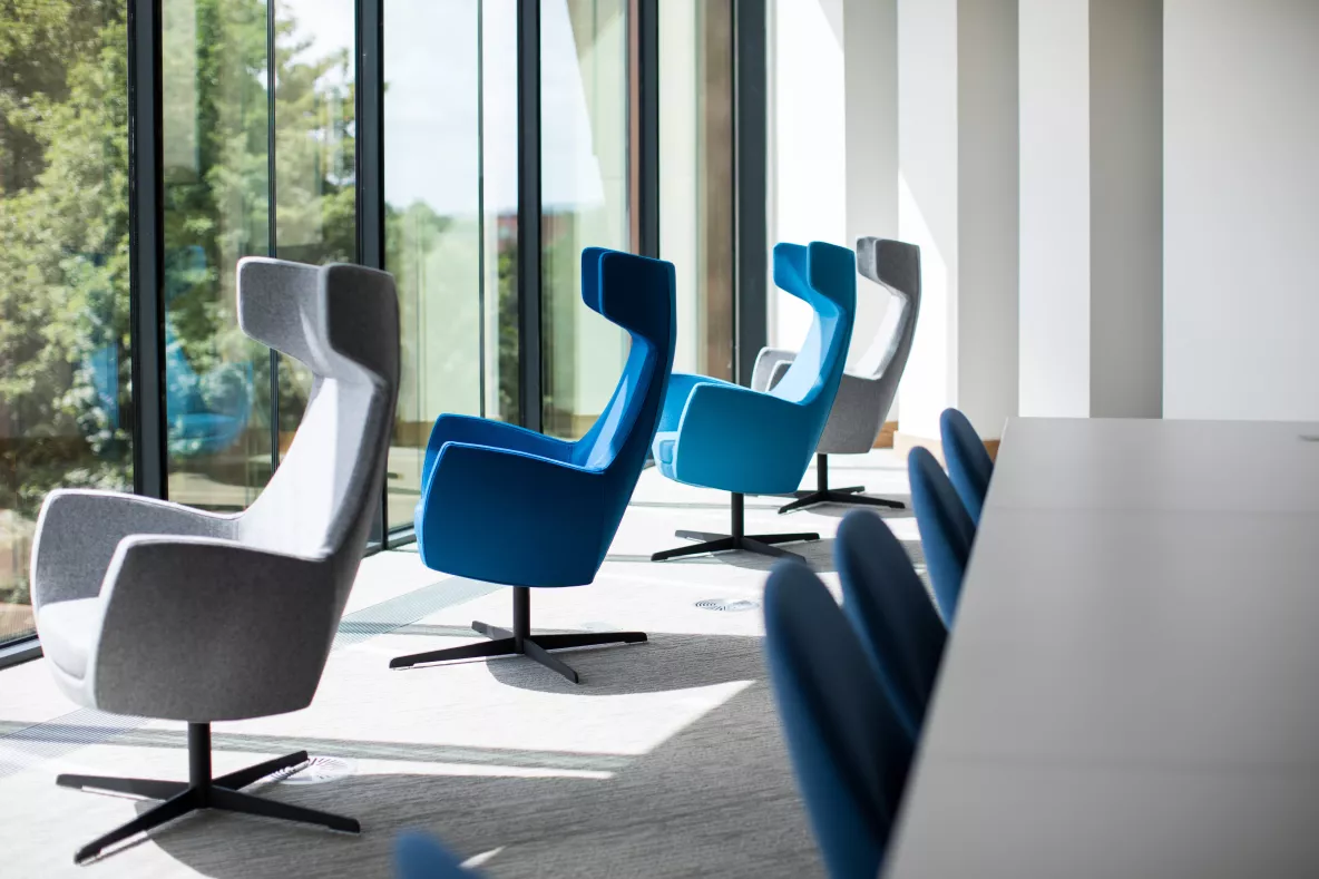 chairs facing a large window