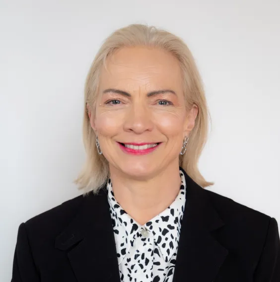 Progile picture showing Katrina Bradley, a blonde lady wearing a black jacket 