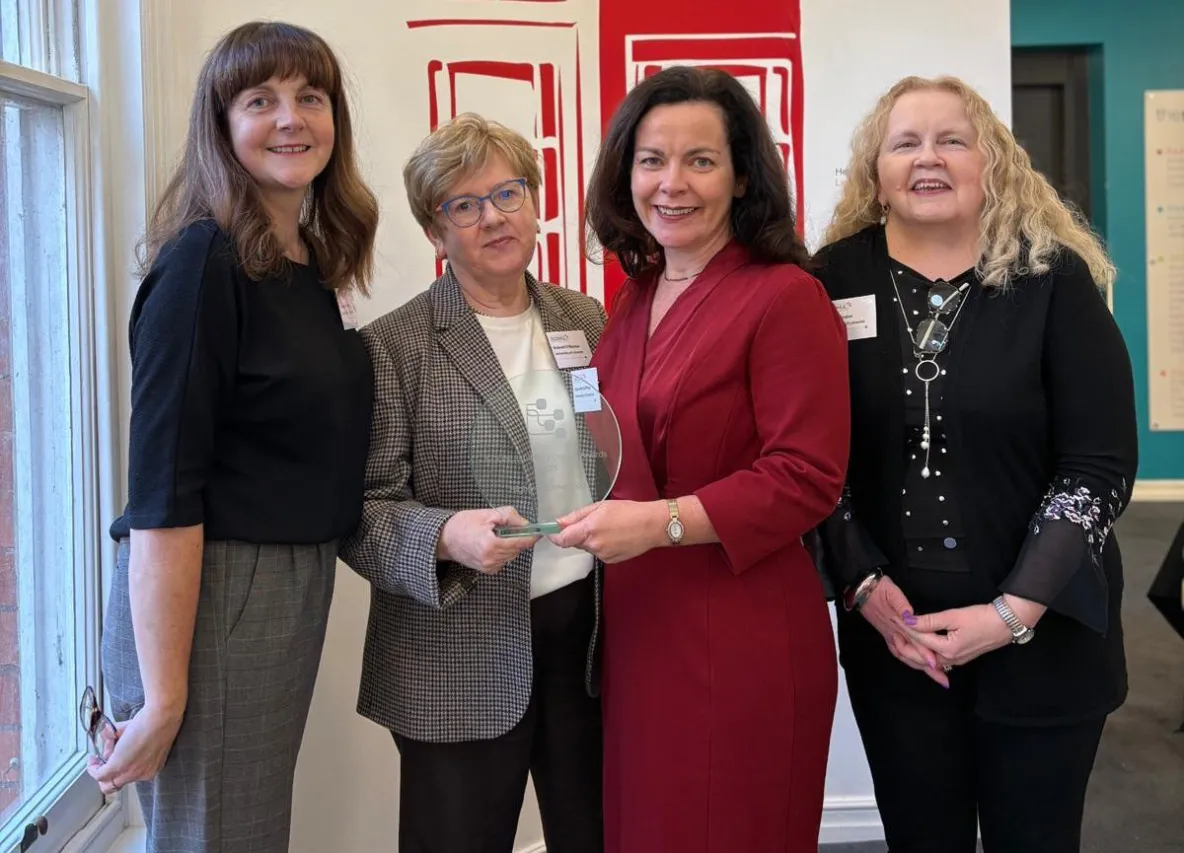 4 people with an award