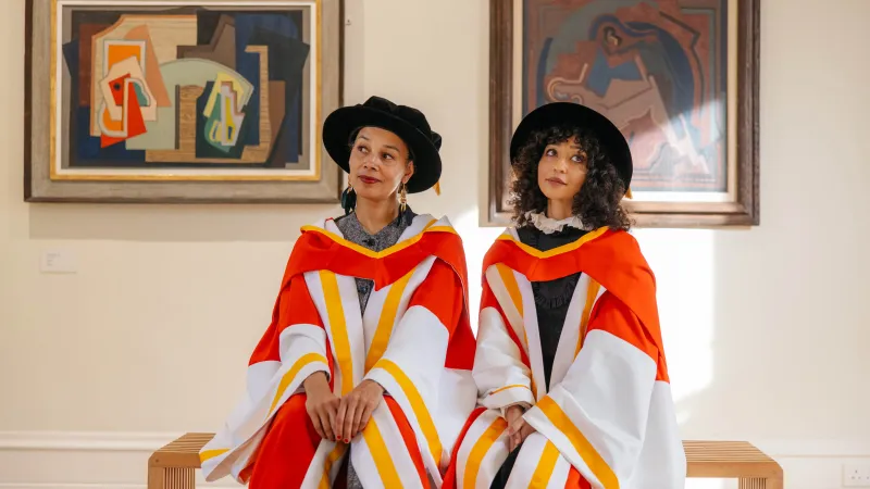 Rhiannon Giddens and Ruth Negga pictured in UL in their honorary doctorate robes