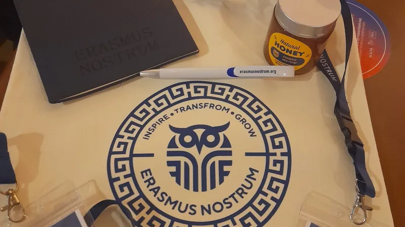 name badges and logo of Greek University 